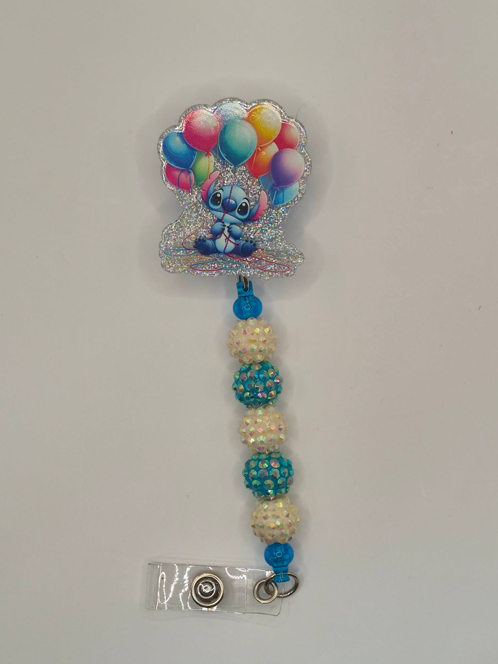 Blue alien with Balloons blue and white